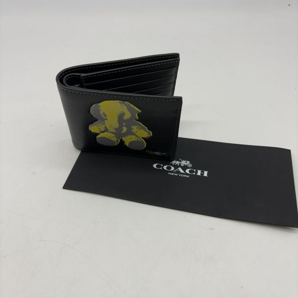 Coach Black Leather Bi-Fold Wallet with Yellow Ellie Graphic